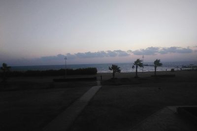 Scenic view of road against sky during sunset