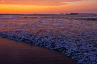 Scenic view of sea against sky during sunset