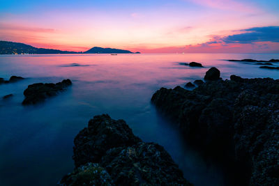 Scenic view of sea against sky during sunset