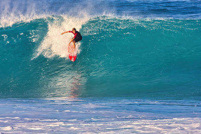 Man surfing in sea