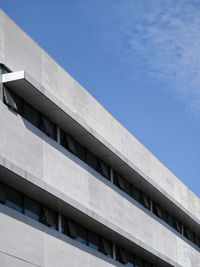 Low angle view of building against blue sky