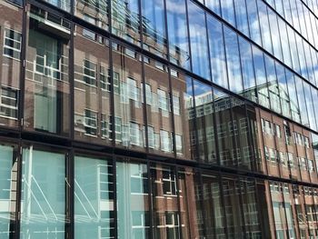 Reflection of building on window