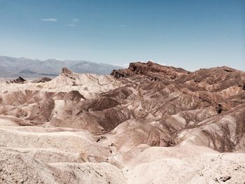 Scenic view of desert against clear sky