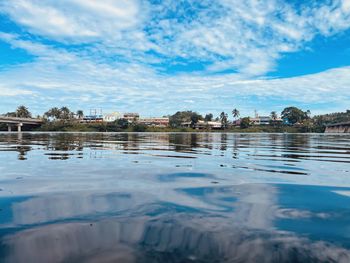 Surface level of lake against sky