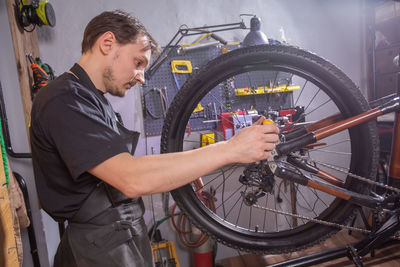 Man working on bicycle