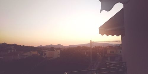 High angle view of townscape against sky during sunset