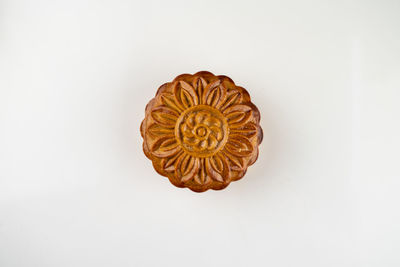 High angle view of spiral on white background