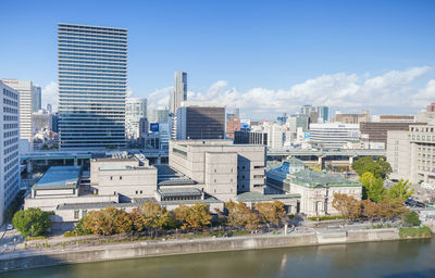 Buildings in city against sky