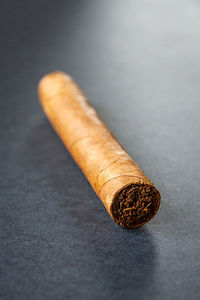 Close-up of cigarette on table