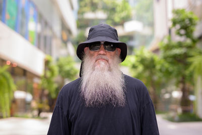 Portrait of man against blurred background