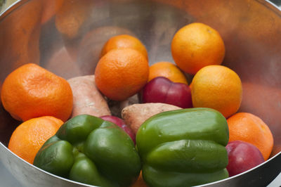 Close-up of fruits and vegetable in container