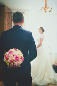 Woman holding flower bouquet