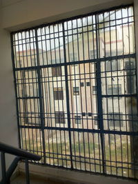 Close-up of metal grate in window