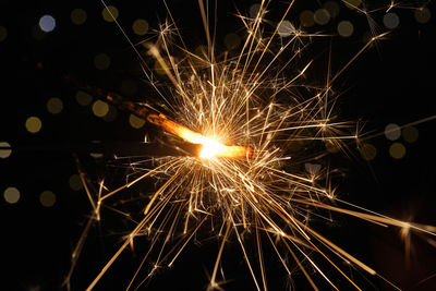 Firework display at night