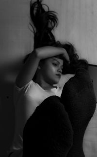 Midsection of woman at home