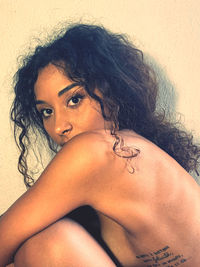 Portrait of young woman looking away