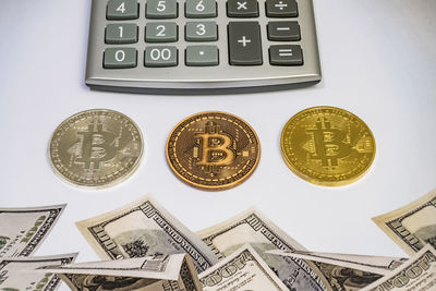 High angle view of coins on table