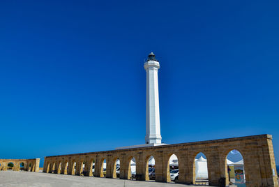 Low angle view of monument against blue sky