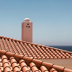 Stone roof of building against clear sky