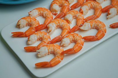 High angle view of prawns in plate on table