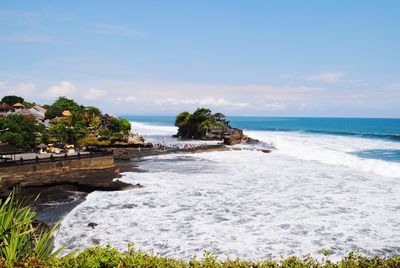 Scenic view of beach against sky