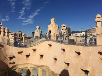 Low angle view of buildings in city against sky