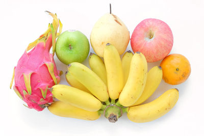 High angle view of fruits on white background