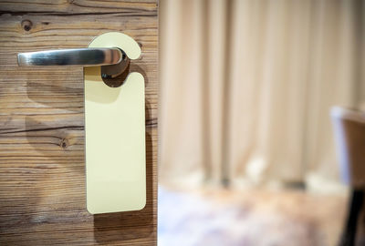 Close-up of door handle on table