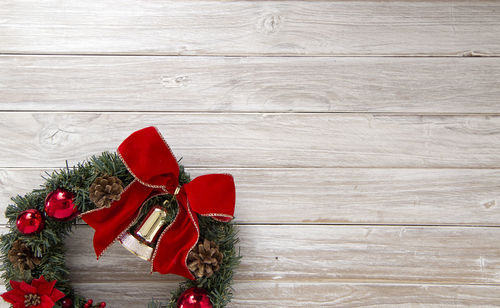 Close-up of wreath on wooden table