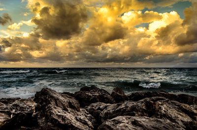 Scenic view of sea against sky during sunset