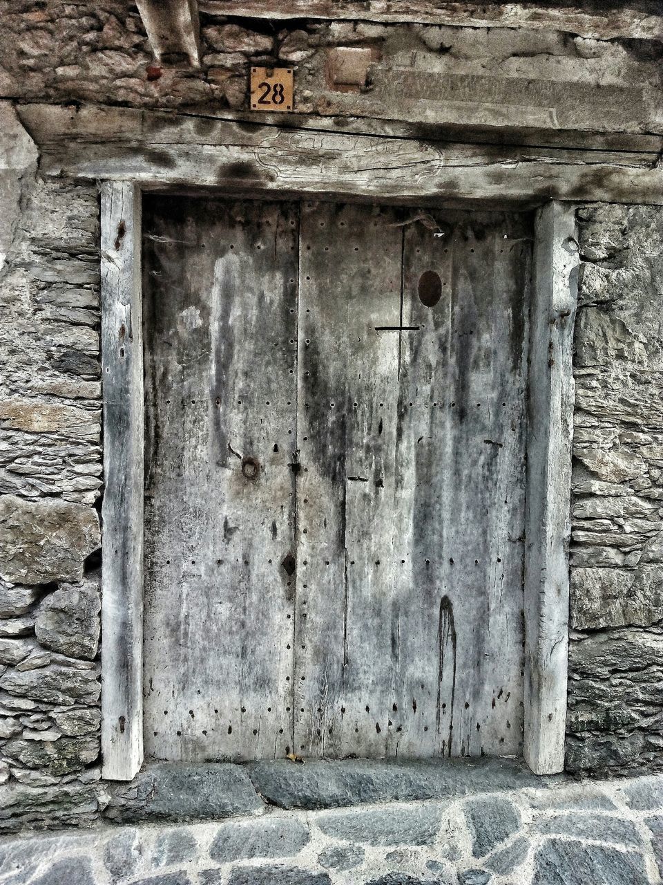 architecture, built structure, building exterior, old, weathered, wall - building feature, damaged, abandoned, brick wall, door, stone wall, wall, house, obsolete, run-down, deterioration, window, textured, bad condition, day