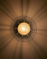 Low angle view of illuminated lamp