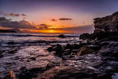 Scenic view of sea against sky during sunset