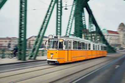 Blurred motion on tram on track in city