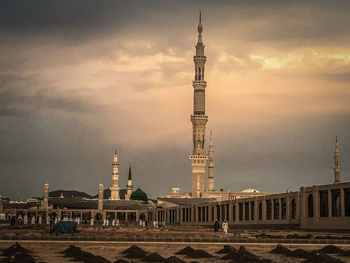 Building against cloudy sky