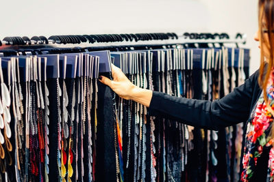 Woman choosing color swatches at store