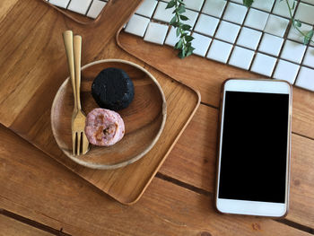 High angle view of mobile phone on table