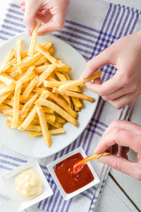 Midsection of woman having food