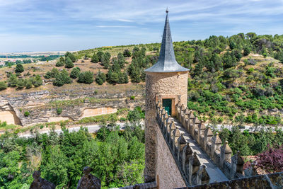 View of temple against building