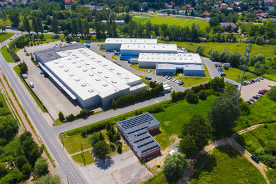 Aerial drone on trucks and logistic center. warehouse aerial. modern logistics center, white van 