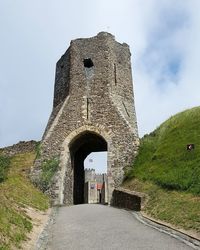 Archway of historical building against sky