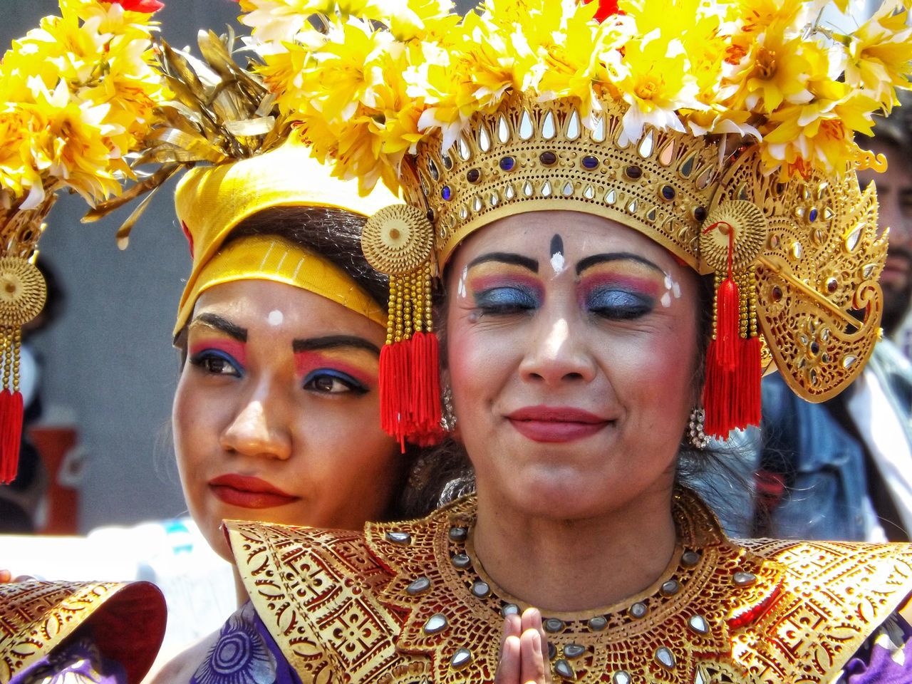 headshot, portrait, gold colored, real people, front view, young adult, belief, religion, one person, art and craft, young women, indoors, focus on foreground, lifestyles, close-up, spirituality, traditional clothing, day