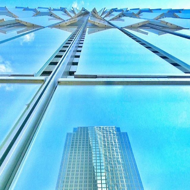 LOW ANGLE VIEW OF SKYSCRAPERS AGAINST SKY