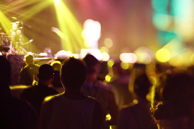 Defocused image of crowd at music concert