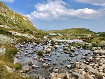 Scenic view of rocks against sky