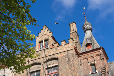 Low angle view of historic building against sky