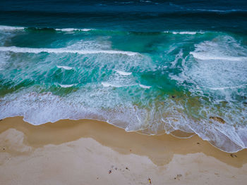 Waves splashing on beach