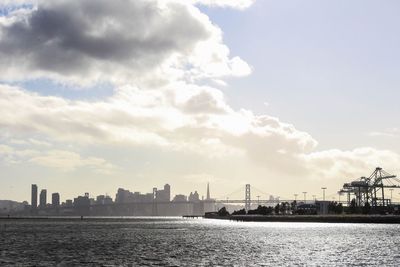 Suspension bridge over river in city