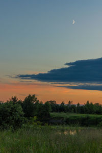 Scenic view of landscape against sky during sunset