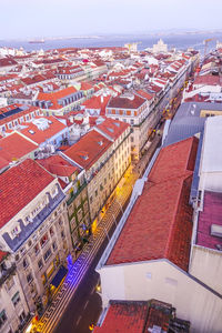 High angle view of buildings in city against sky